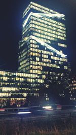 Illuminated buildings in city at night