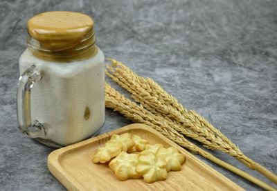 Close-up of drink in glass jar on table