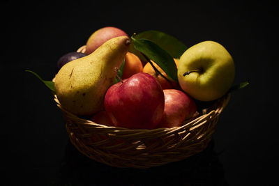 Close-up of fruit in basket caravaggio style