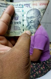 High angle view of people holding hands