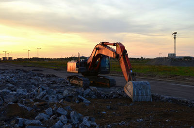 View of construction site against sky during sunset