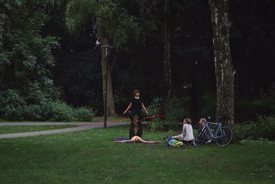 Full length of woman standing on grass