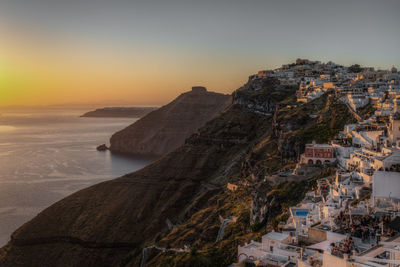 Beautiful romantic sunset at fira village,  santorini, greece