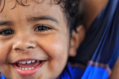 Close-up portrait of smiling boy