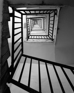 Directly below shot of spiral staircase of building