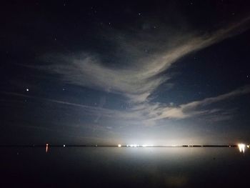 Scenic view of sea against sky at night