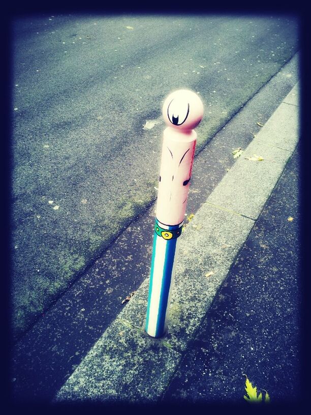 transfer print, street, auto post production filter, high angle view, childhood, human representation, road, shadow, one person, day, outdoors, sunlight, asphalt, sidewalk, road marking, white color, toy, close-up, transportation