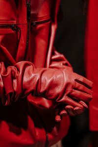 Midsection of woman holding hands