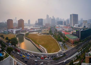 High angle view of street amidst buildings in city