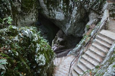 High angle view of steps by caves