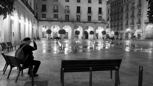 Woman standing in city