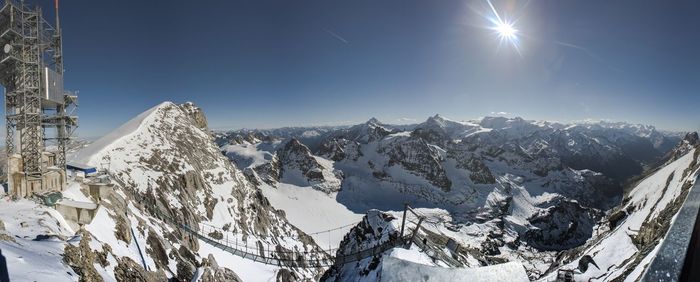 Scenic view of snow covered mountains