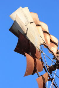 Low angle view of building against blue sky