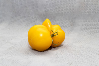Close-up of yellow lemon on table