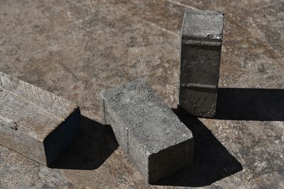 High angle view of stone on floor