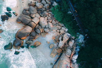 High angle view of stones in sea