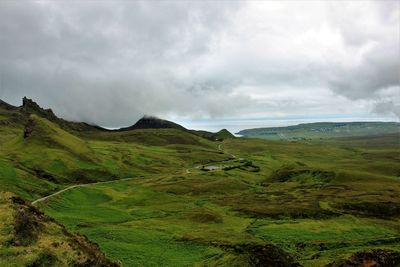 Scenic view of land and mountains 