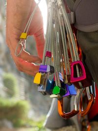 Midsection of man with tool belt 