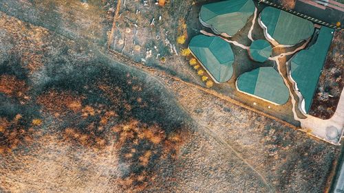 High angle view of rusty metal on street