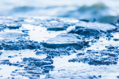 Full frame shot of rocks in sea