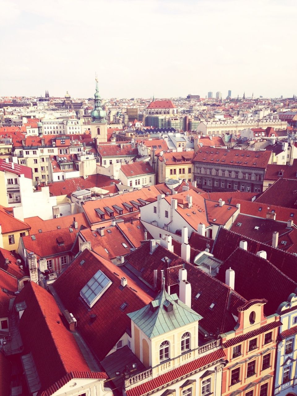 building exterior, architecture, built structure, crowded, residential district, cityscape, residential structure, residential building, roof, high angle view, city, house, townscape, town, human settlement, community, clear sky, day, outdoors, housing settlement