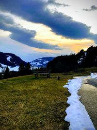 Scenic view of landscape against sky during sunset