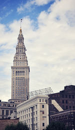 High section of building against cloudy sky