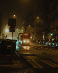 Illuminated street at night