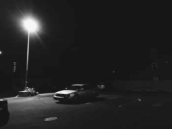 Cars on road at night