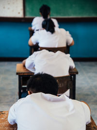 Rear view of couple sitting