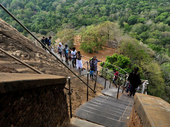 High angle view of people on staircase