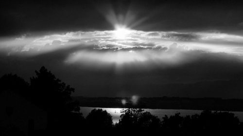 Scenic view of landscape against cloudy sky