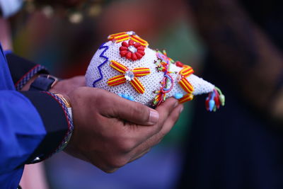 Close-up of woman holding hands