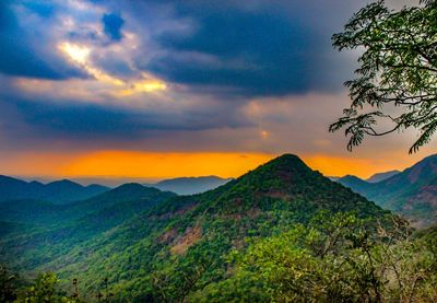 Scenic view of mountains against sky during sunset