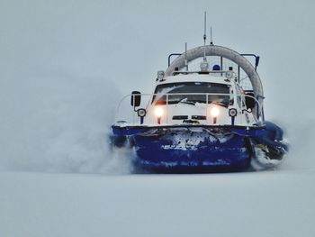 High angle view of illuminated car on snow