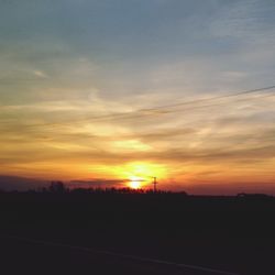 Scenic view of landscape at sunset