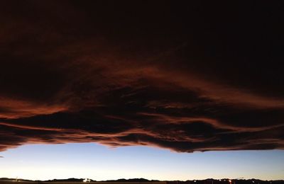 Low angle view of dramatic sky during sunset