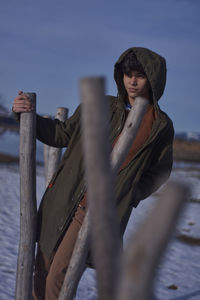 Man standing outdoors during winter