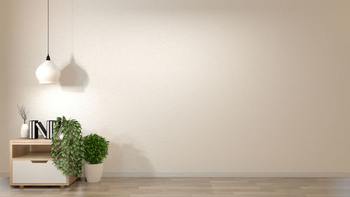 White flowers hanging on table at home