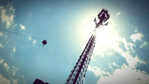 Low angle view of silhouette man against sky