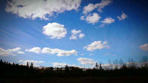 Scenic view of landscape against cloudy sky