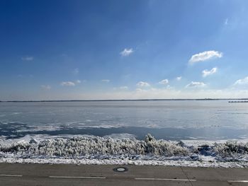 Scenic view of sea against sky during winter