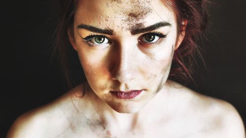 Close-up portrait of young woman