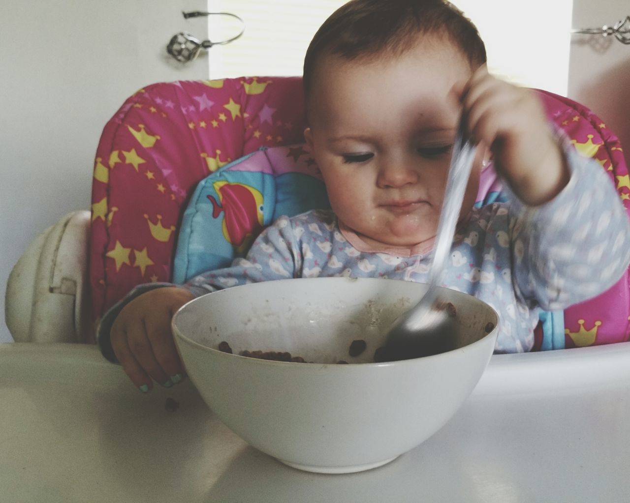 Baby eating breakfast