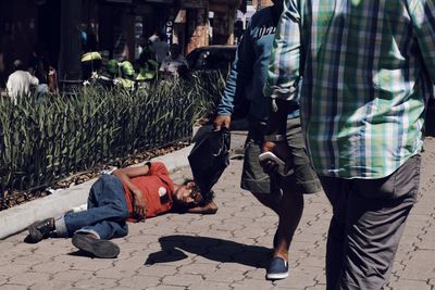 People on street in city