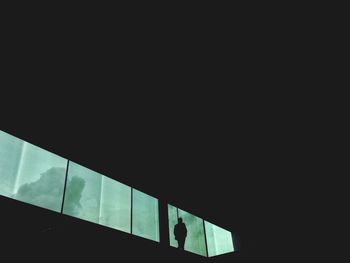 Low angle view of man against sky