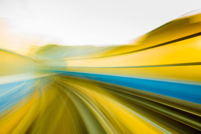 Close-up of yellow blurred road