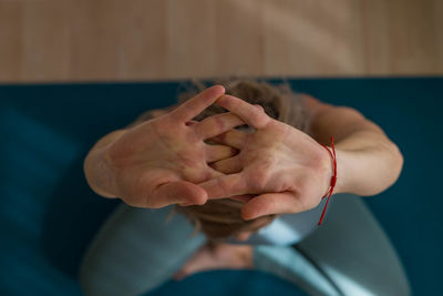 Cropped hand of man holding heart shape
