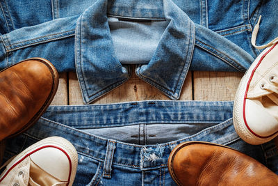 Low section of man wearing shoes