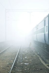 Road passing through foggy weather
